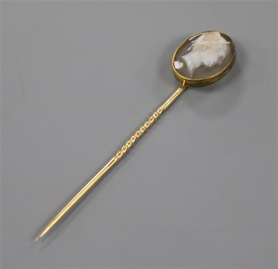 A 19th century yellow metal and sardonyx oval cameo stick pin, carved with the bust of Hermes to sinister, signed in Greek,